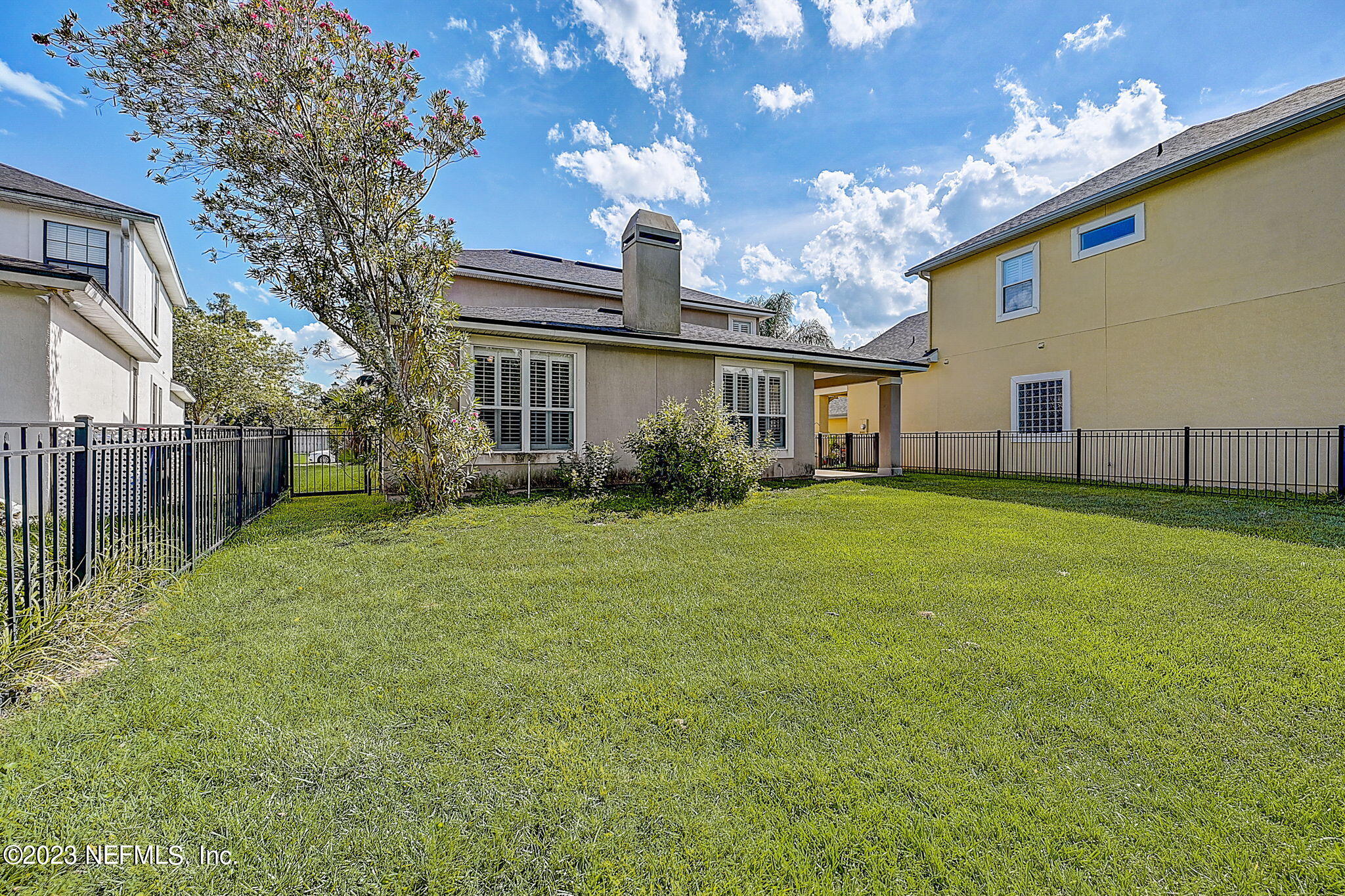 1828 Rear Admiral Lane St. Johns, FL 32259 - Photo 39 of 48 a front view of house with yard