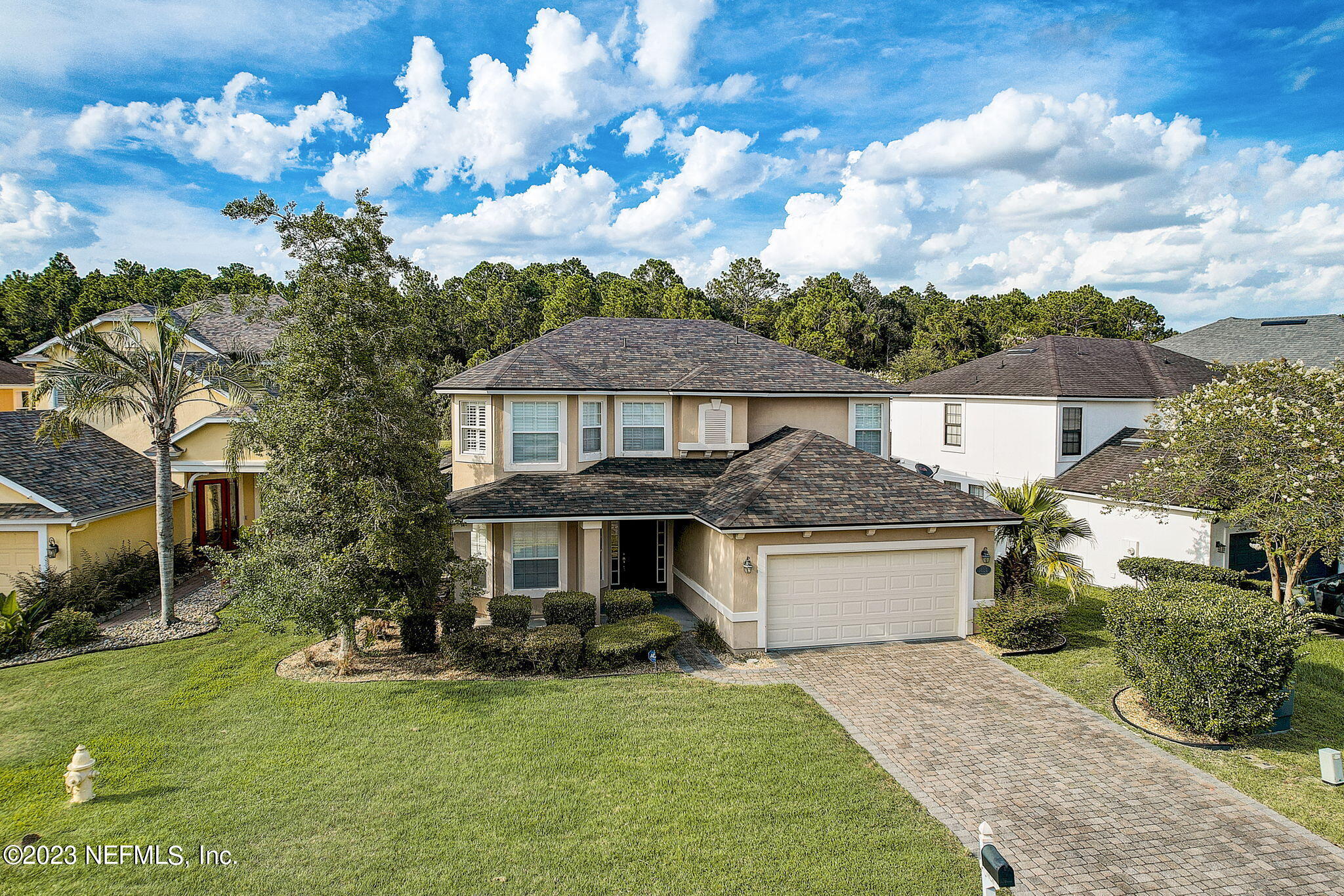 1828 Rear Admiral Lane St. Johns, FL 32259 - Photo 42 of 48 a front view of a house with garden