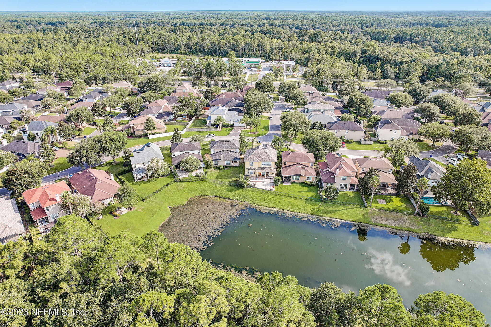 1828 Rear Admiral Lane St. Johns, FL 32259 - Photo 47 of 48 an aerial view of residential houses with outdoor space and lake view