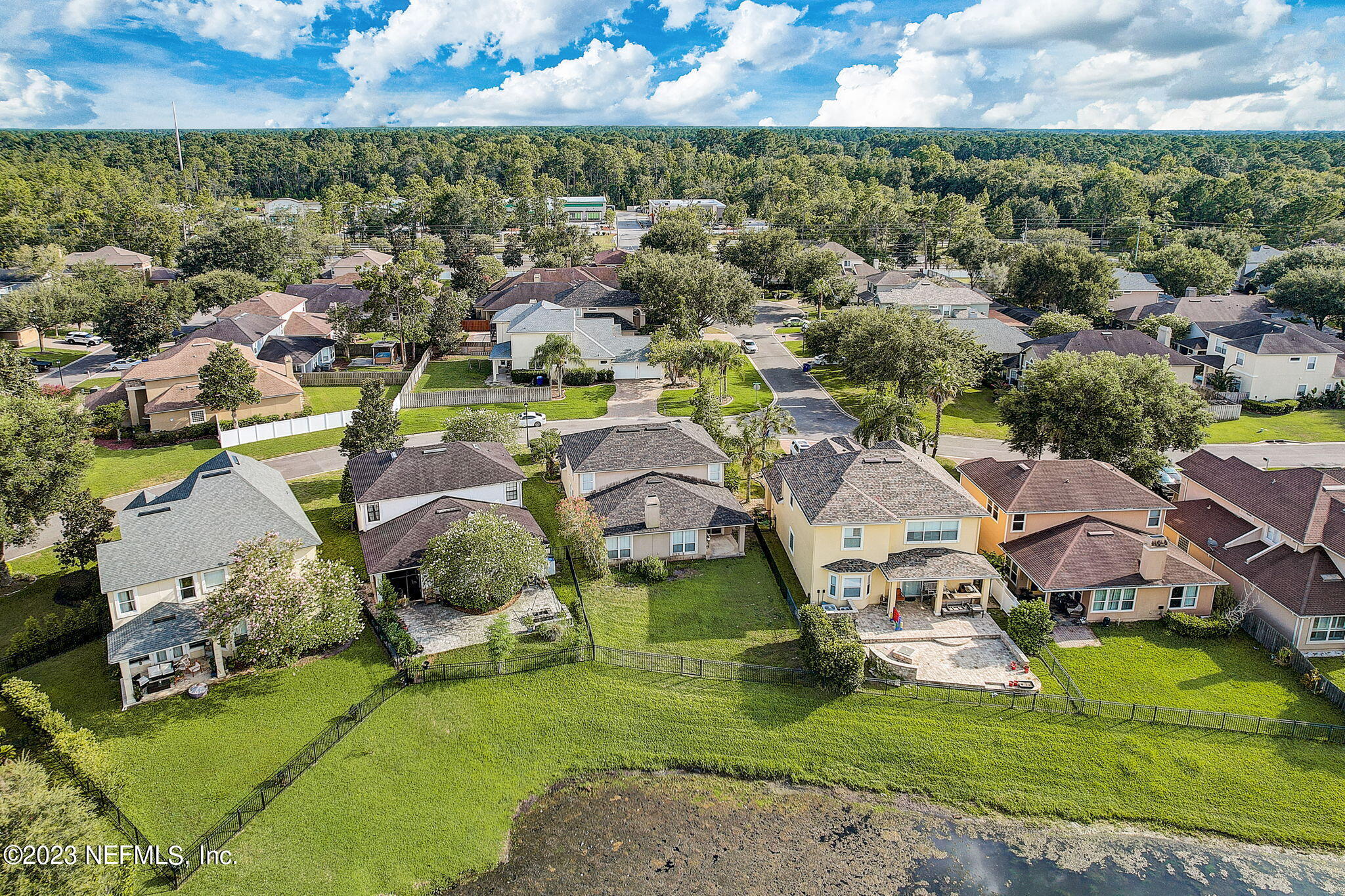 1828 Rear Admiral Lane St. Johns, FL 32259 - Photo 48 of 48 an aerial view of residential houses with outdoor space and trees