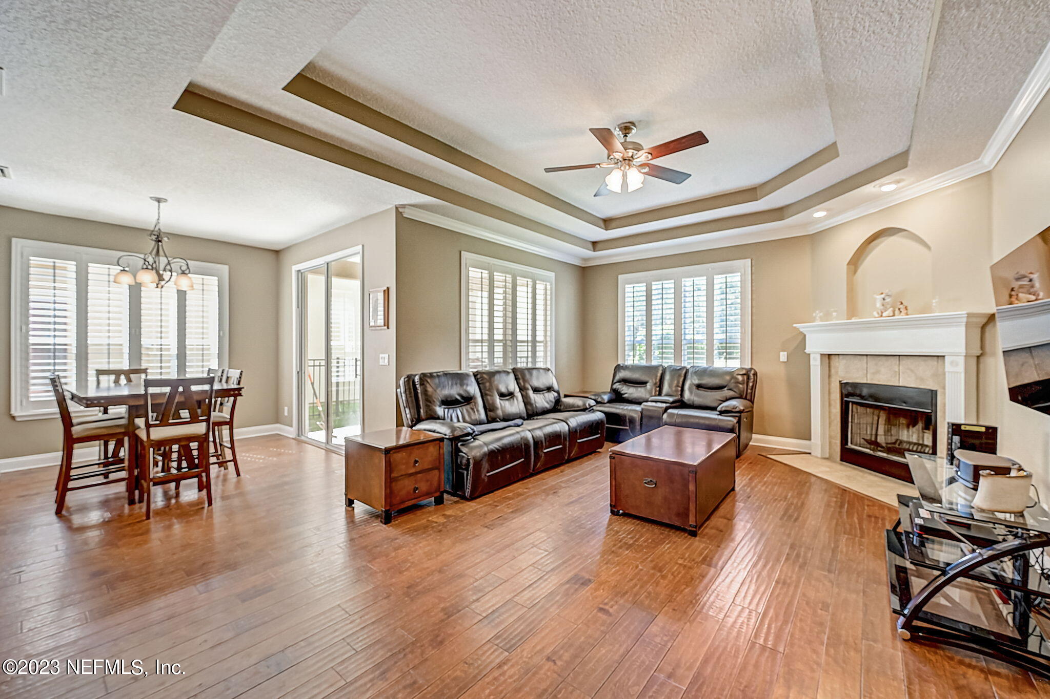 1828 Rear Admiral Lane St. Johns, FL 32259 - Photo 7 of 48 a living room with furniture and a fireplace