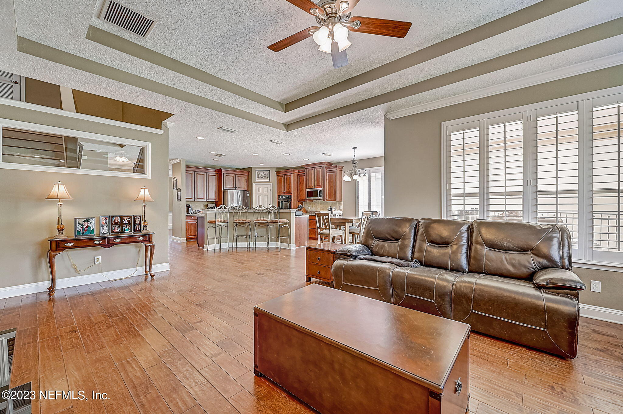 1828 Rear Admiral Lane St. Johns, FL 32259 - Photo 8 of 48 a living room with furniture and a wooden floor