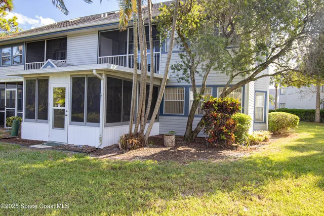 a plant is in front of a house