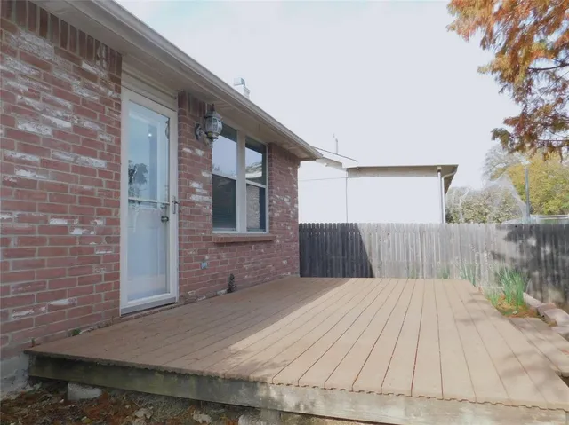 a view of a backyard of the house