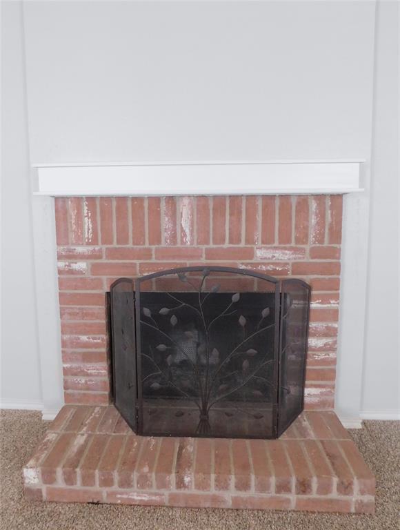 5721 Thoroughbred Trail Denton, TX 76210 - Photo 5 of 24 a closeup of a fireplace