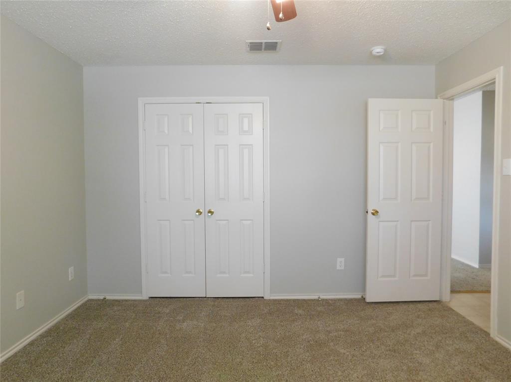 5721 Thoroughbred Trail Denton, TX 76210 - Photo 8 of 24 a view of an empty room