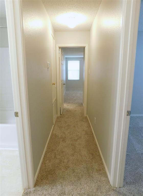 5721 Thoroughbred Trail Denton, TX 76210 - Photo 10 of 24 a view of hallway with shower