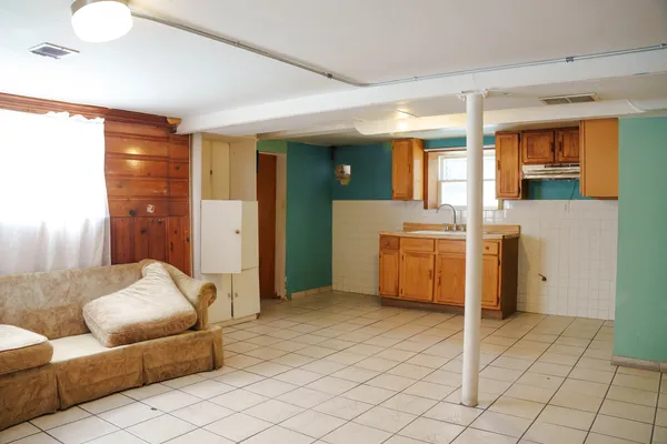 a living room with furniture and a table