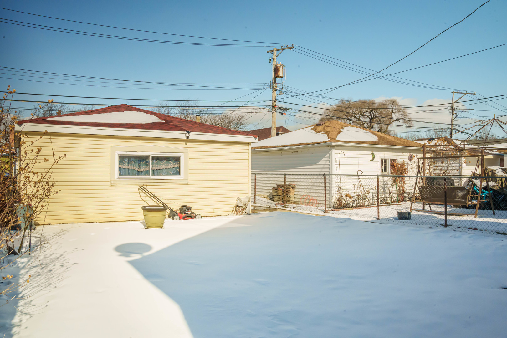 3912 West 55th Place Chicago, IL 60629 - Photo 18 of 20 a view of a house with a patio