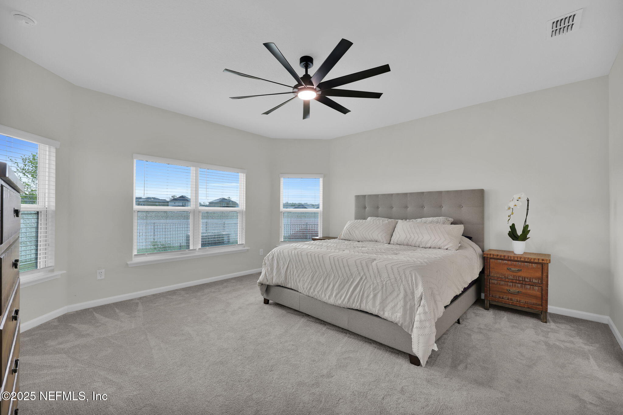 87 Whirlwind Place St. Augustine, FL 32095 - Photo 10 of 44 a bedroom with a bed and window