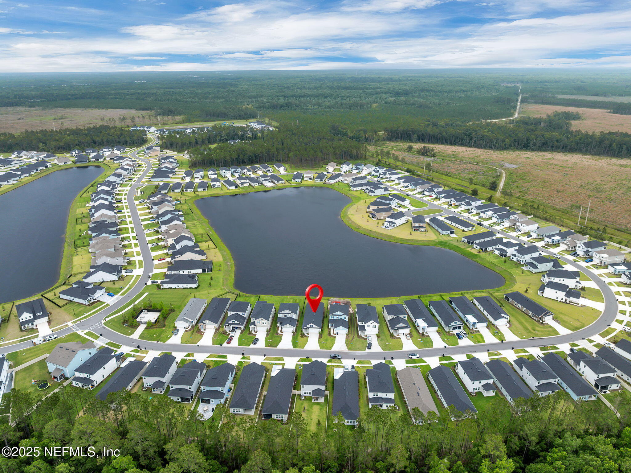 87 Whirlwind Place St. Augustine, FL 32095 - Photo 2 of 44 an aerial view of a house