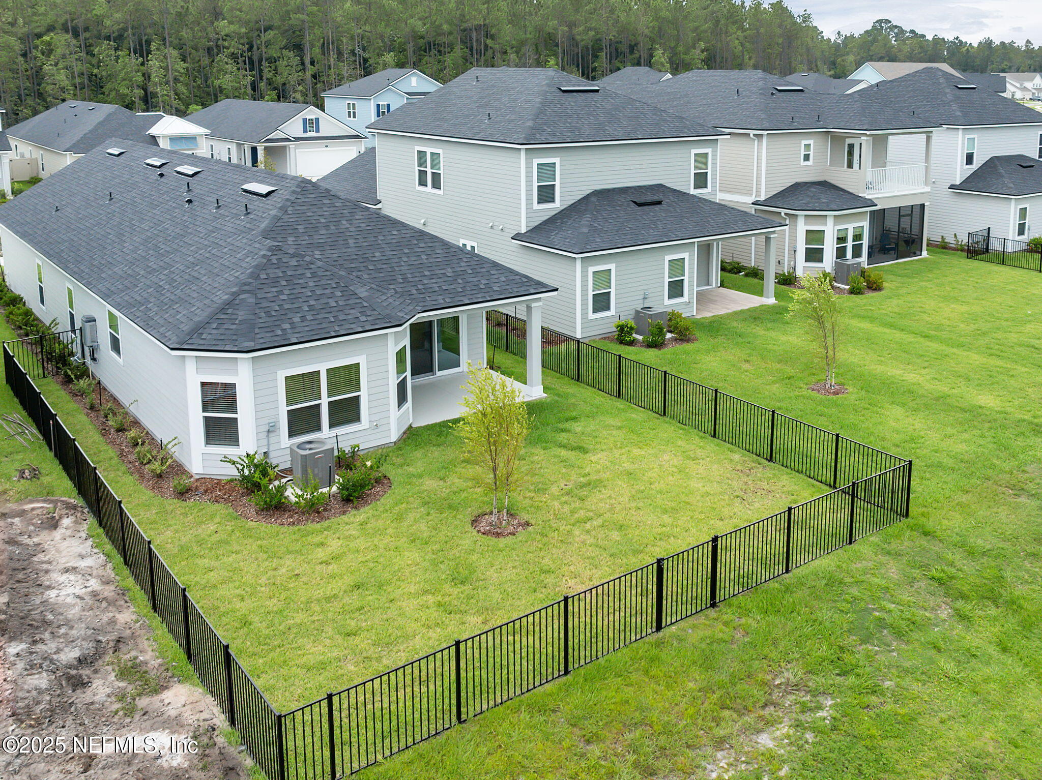 87 Whirlwind Place St. Augustine, FL 32095 - Photo 22 of 44 a view of a house with yard and furniture
