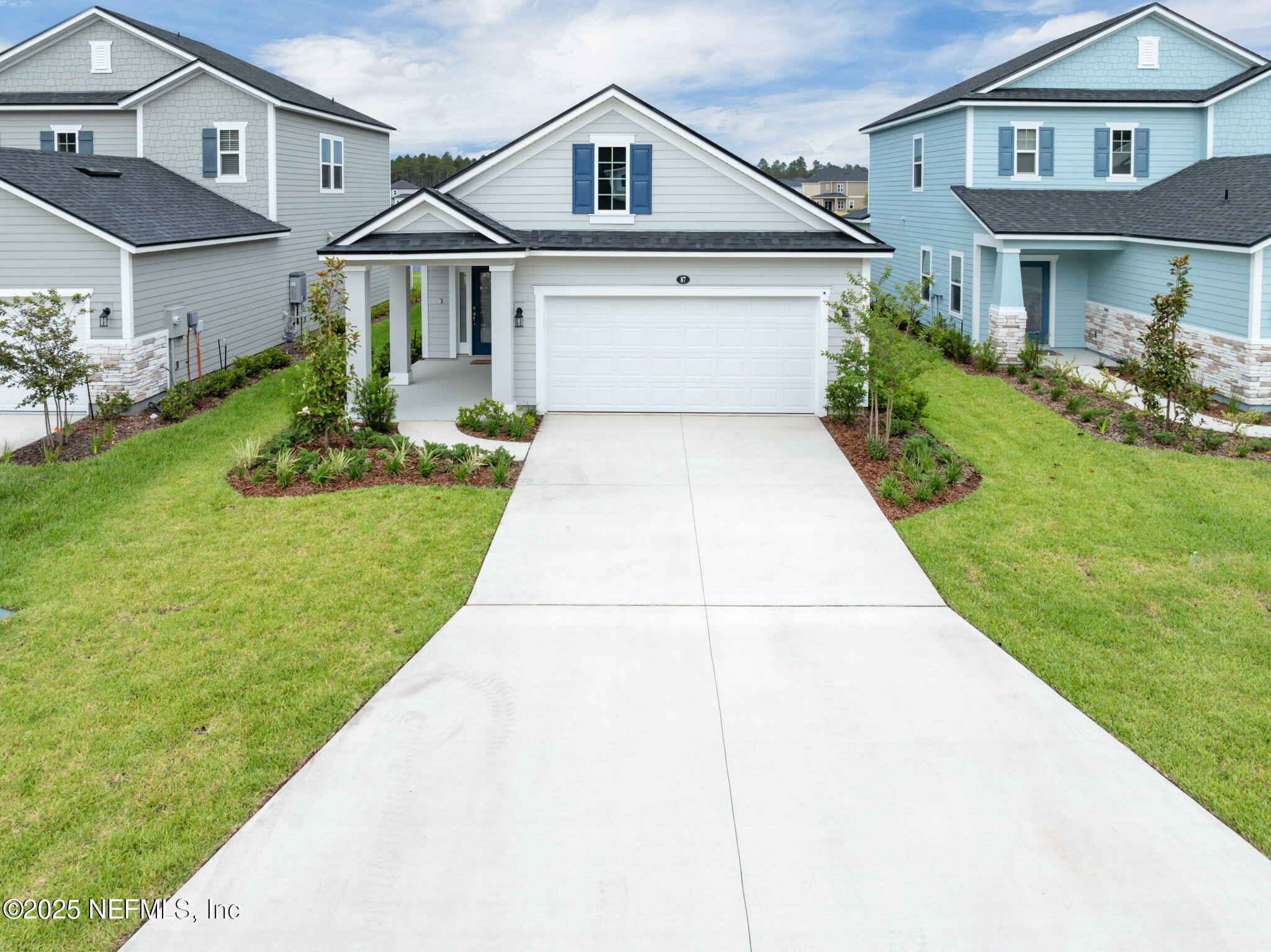 87 Whirlwind Place St. Augustine, FL 32095 - Photo 23 of 44 a front view of house with yard