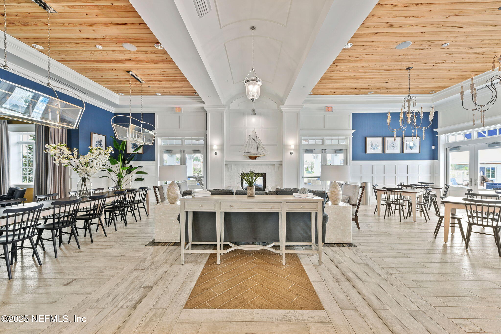 87 Whirlwind Place St. Augustine, FL 32095 - Photo 32 of 44 a living room with lots of furniture and a table