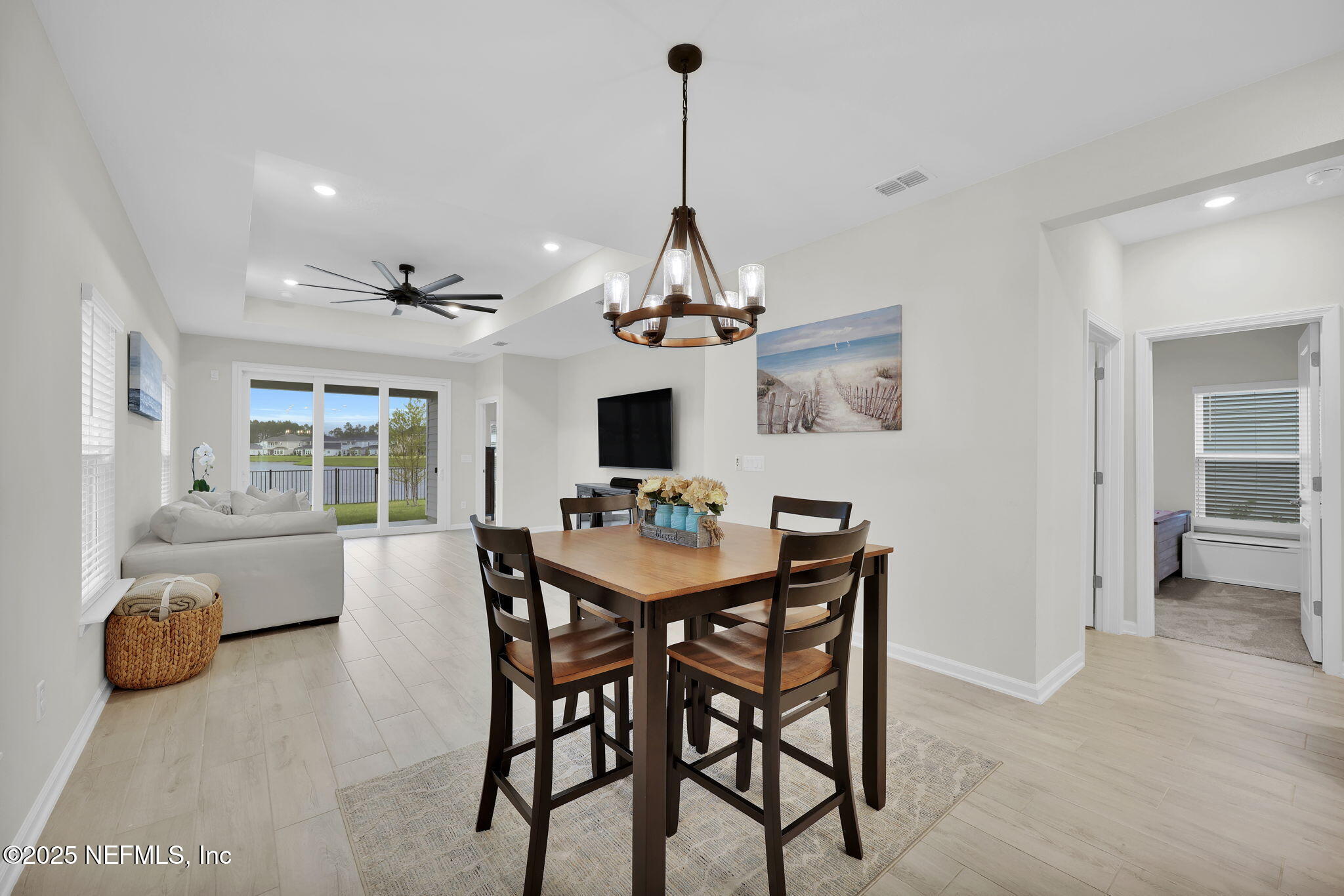 87 Whirlwind Place St. Augustine, FL 32095 - Photo 7 of 44 a view of a dining room with furniture window and wooden floor