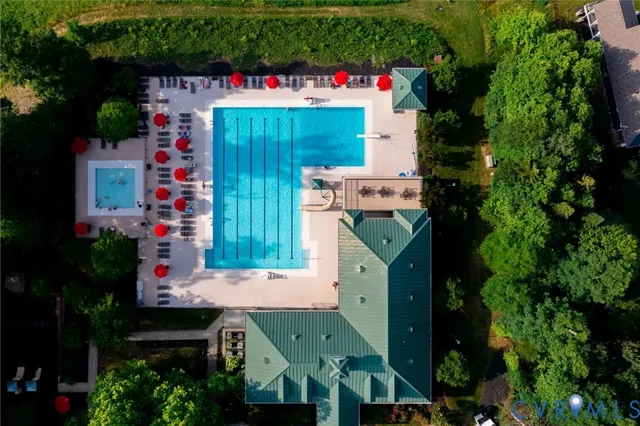an aerial view of residential houses and outdoor space