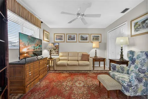 a living room with furniture and a couch