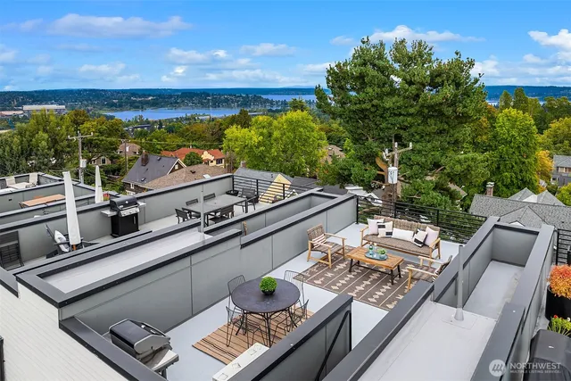 a view of roof deck with patio
