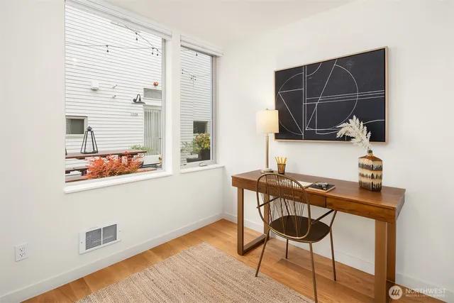 a room with a table and chairs