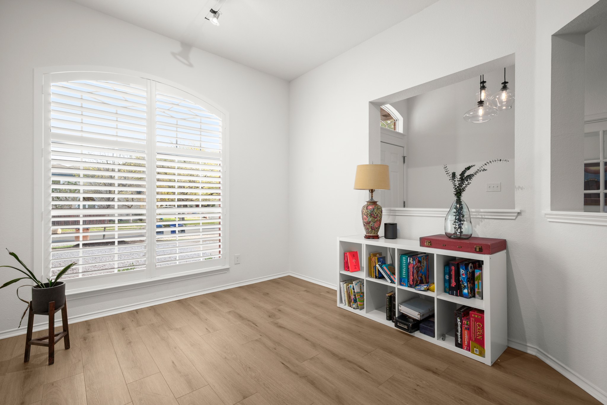 4523 Ramies Run Austin, TX 78749 - Photo 8 of 30 Living area with light wood-style floors and baseboards