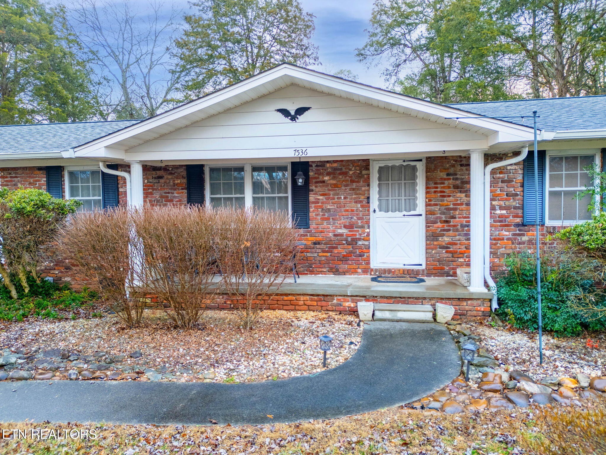 7536 Rodgers Road Corryton, TN 37721 - Photo 7 of 41 a front view of a house with garden