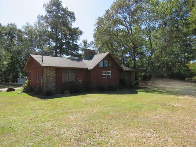 3774 Holley Road Lizella, GA 31052 - Photo 1 of 13 a front view of a house with a yard