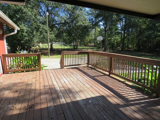 3774 Holley Road Lizella, GA 31052 - Photo 3 of 13 a view of deck with wooden floor and outdoor space