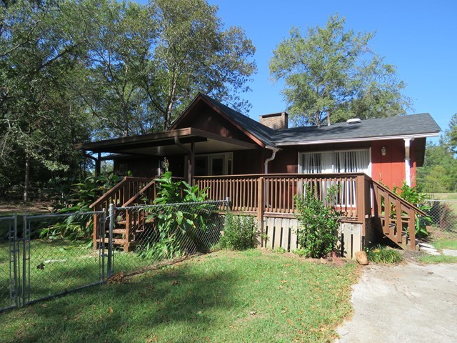 3774 Holley Road Lizella, GA 31052 - Photo 5 of 13 a front view of house with yard and green space