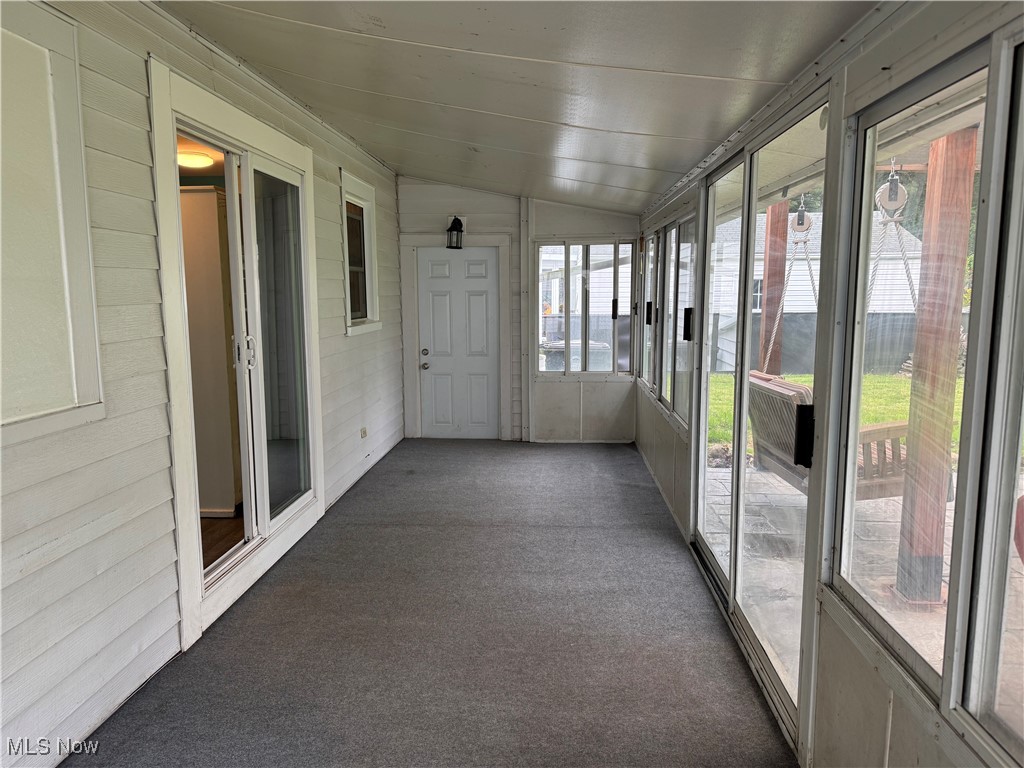 1139 Kessel Avenue Akron, OH 44310 - Photo 34 of 36 Unfurnished sunroom with lofted ceiling