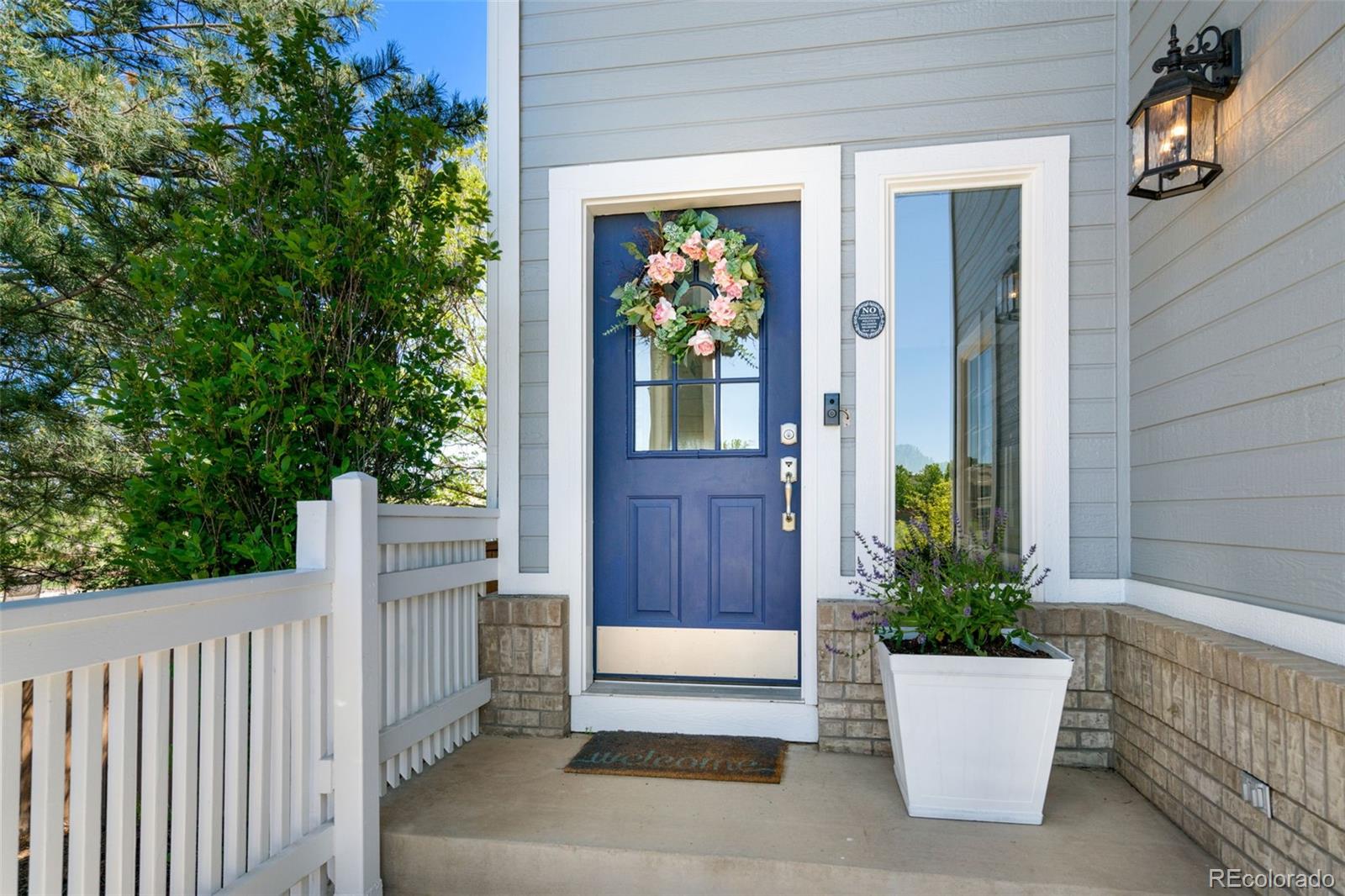 2667 West Bitterroot Place Highlands Ranch, CO 80129 - Photo 2 of 40 a view of a entryway door front of house