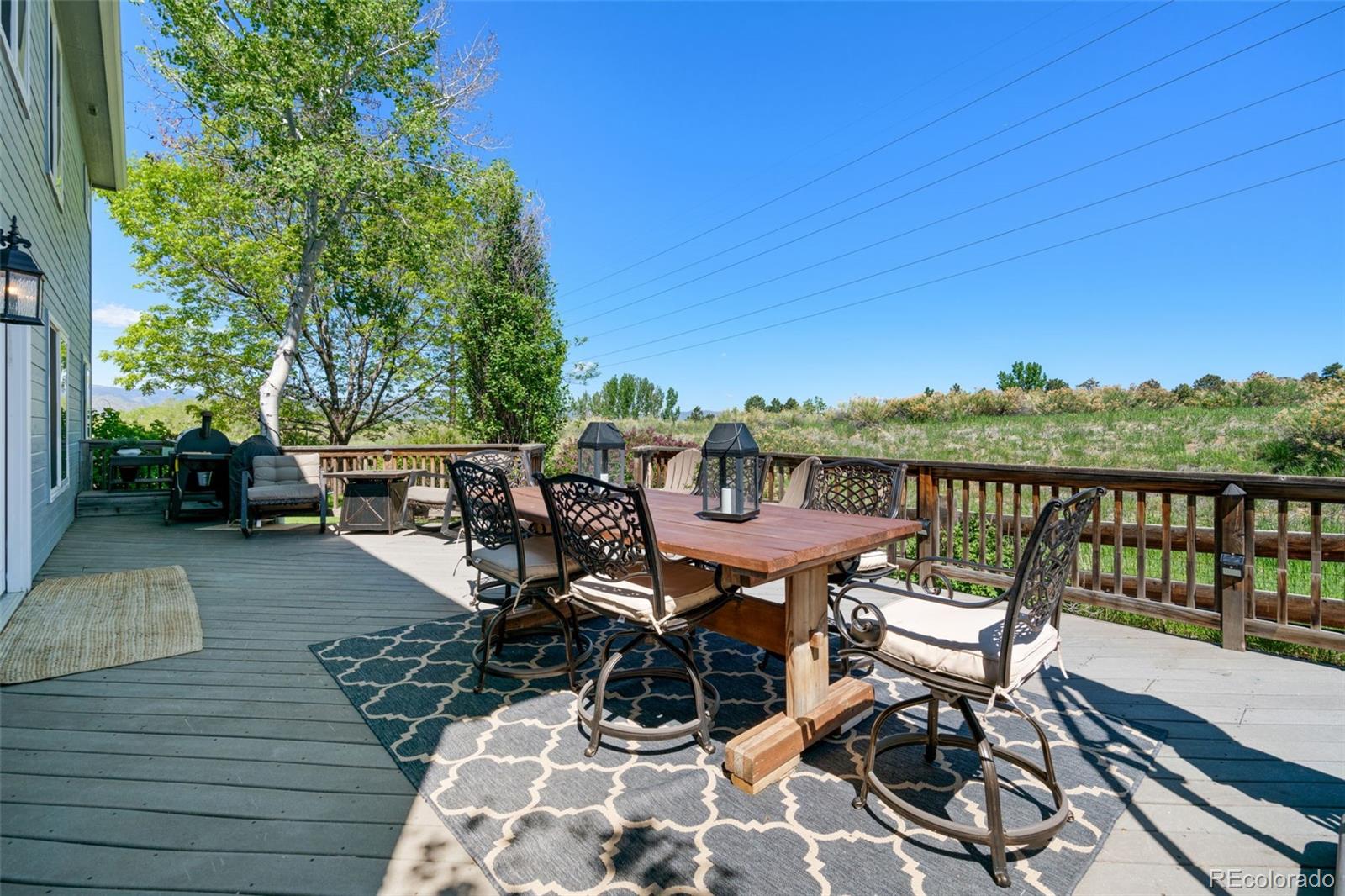 2667 West Bitterroot Place Highlands Ranch, CO 80129 - Photo 35 of 40 a view of a terrace with furniture