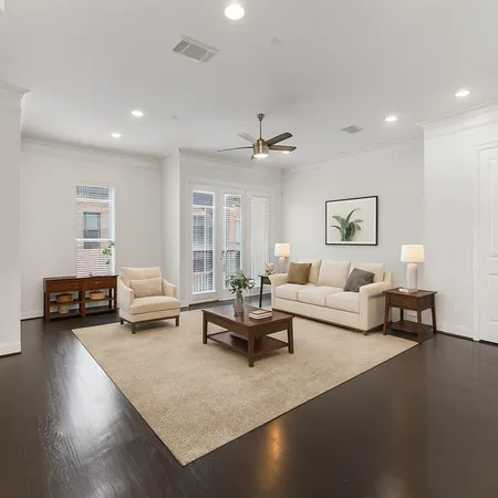 a living room with furniture and a couch