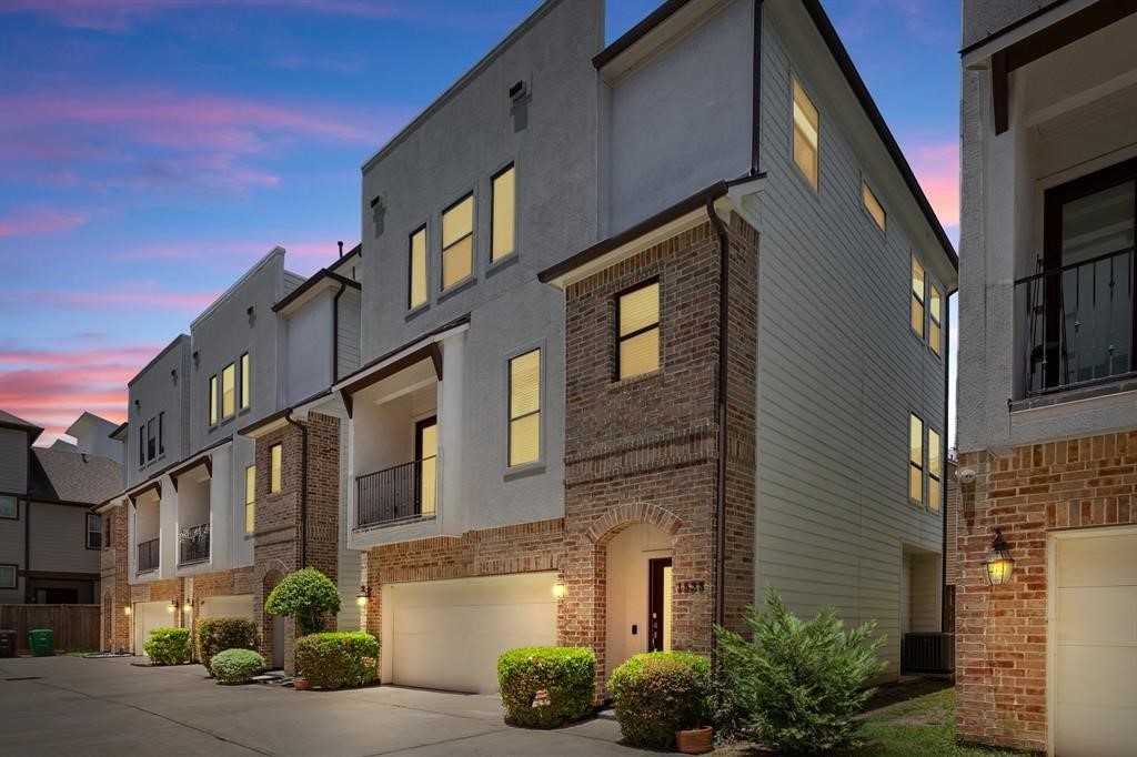 1525 Johnson Street Houston, TX 77007 - Photo 2 of 26 a front view of a multi story residential apartment building