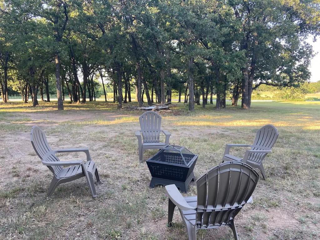 1402 Posey Brewer Road Sunset, TX 76270 - Photo 19 of 19 a view of outdoor space with seating area