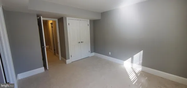 a view of hallway with natural light