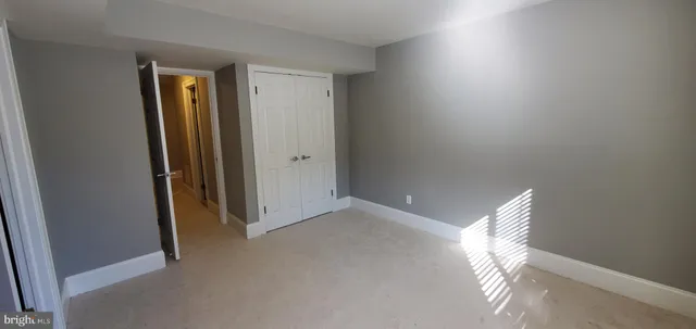 a view of hallway with natural light