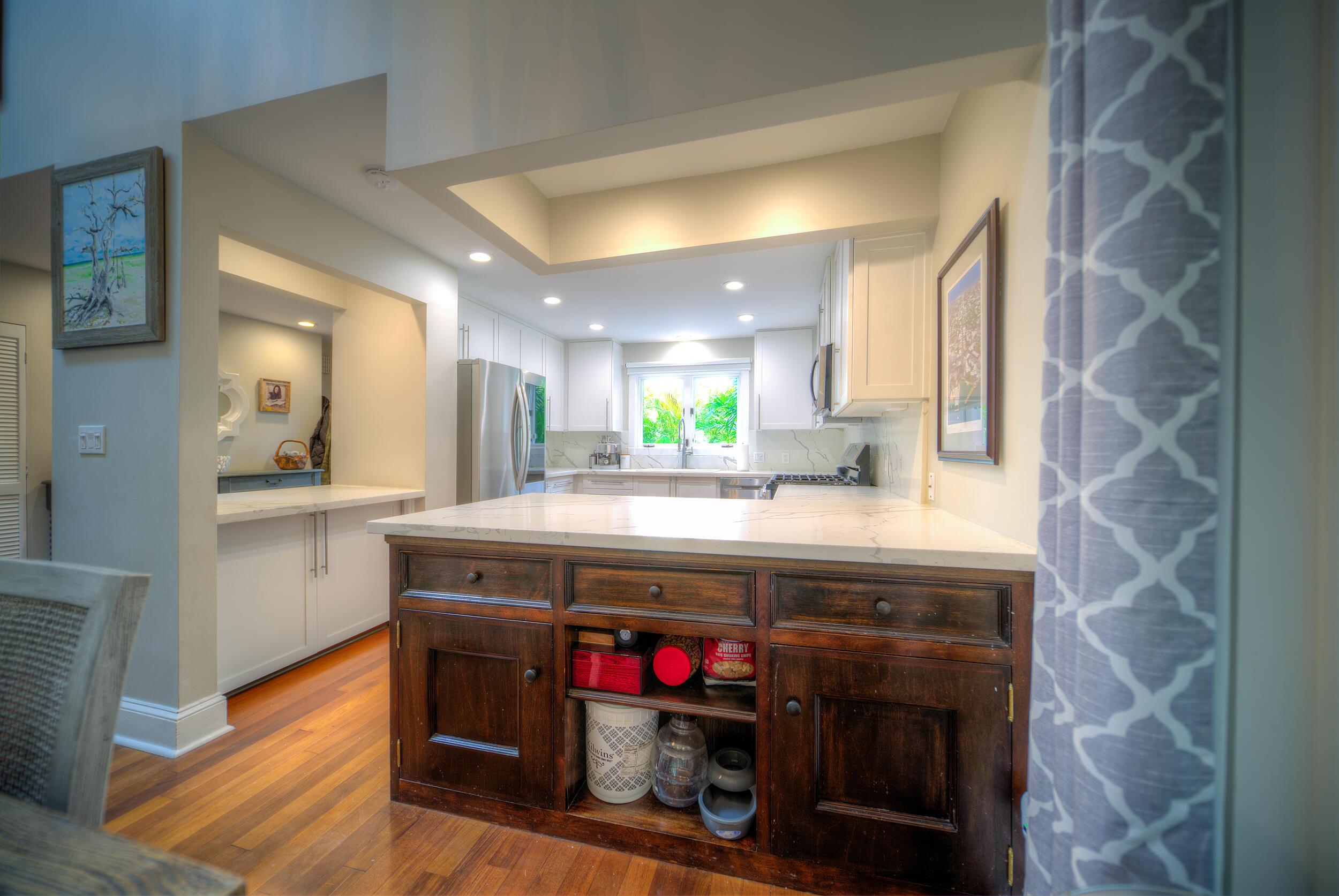 720 Washington Street Key West, FL 33040 - Photo 13 of 33 a kitchen with stainless steel appliances granite countertop a stove and a refrigerator