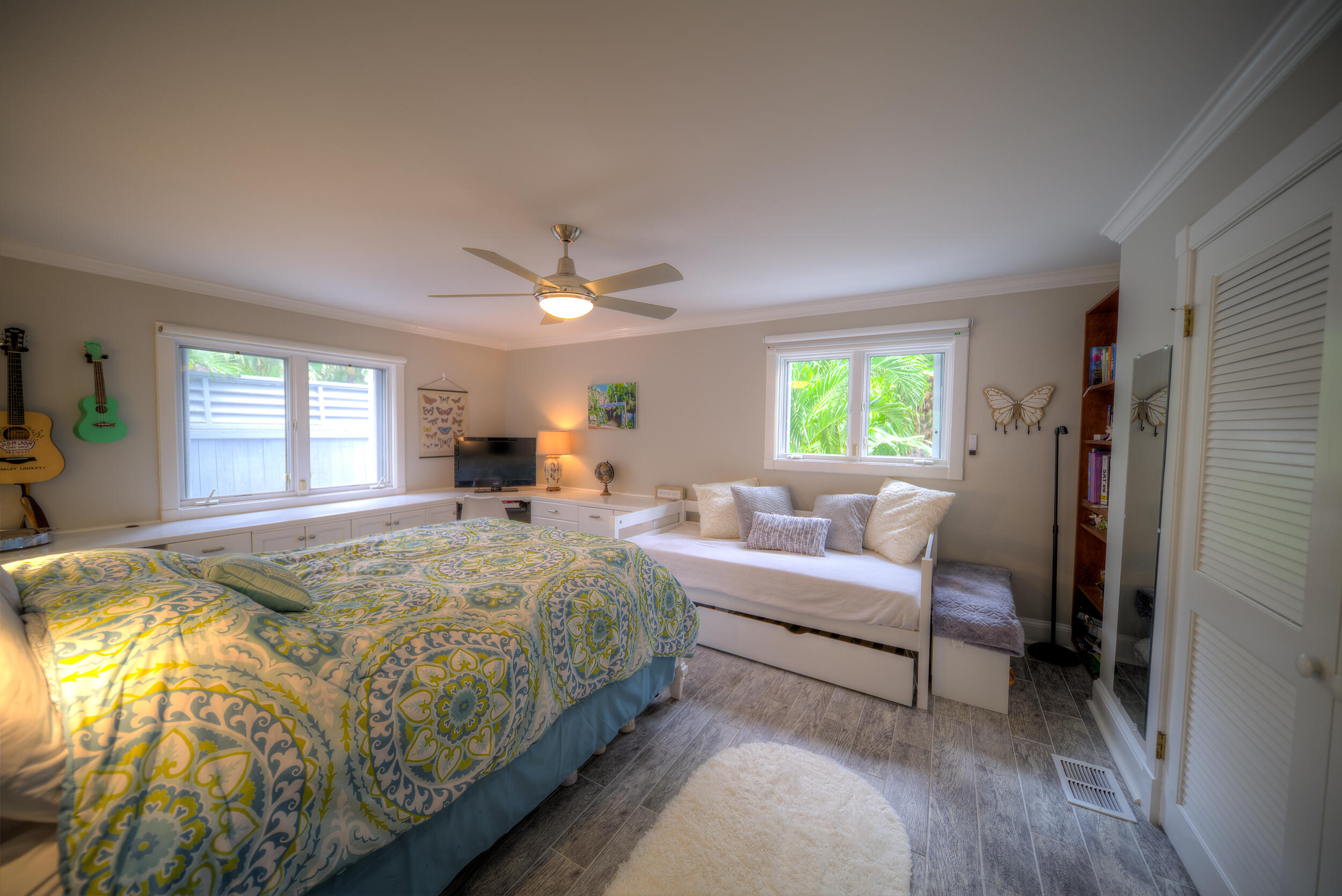 720 Washington Street Key West, FL 33040 - Photo 21 of 33 a bedroom with a bed and a window