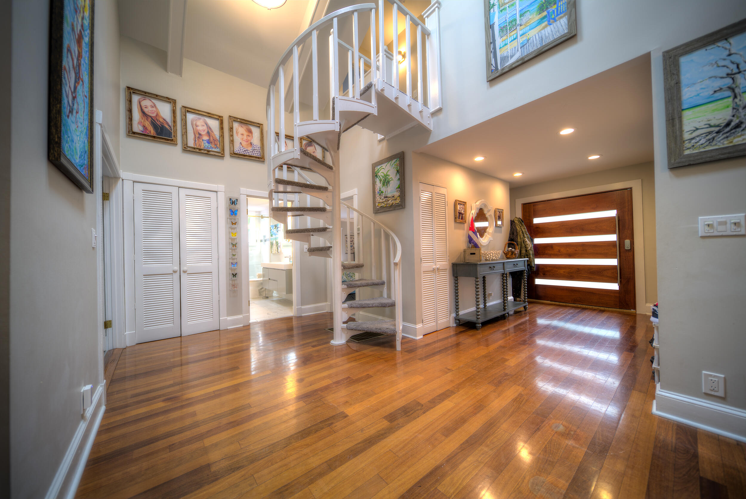 720 Washington Street Key West, FL 33040 - Photo 25 of 33 a view of an entryway with wooden floor
