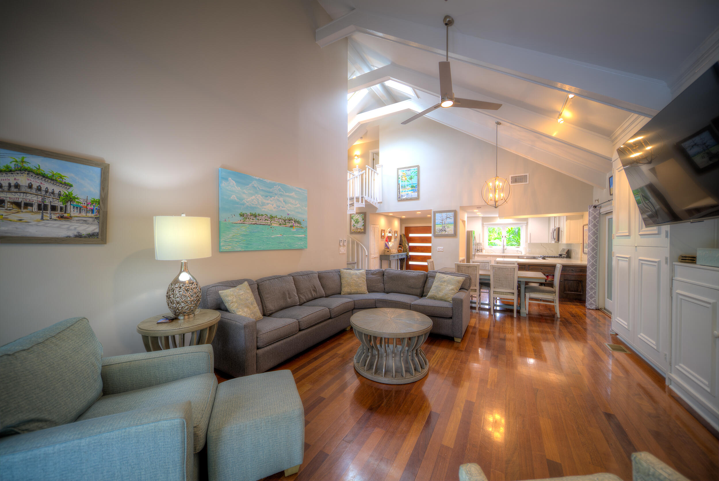 720 Washington Street Key West, FL 33040 - Photo 3 of 33 a living room with furniture and a wooden floor