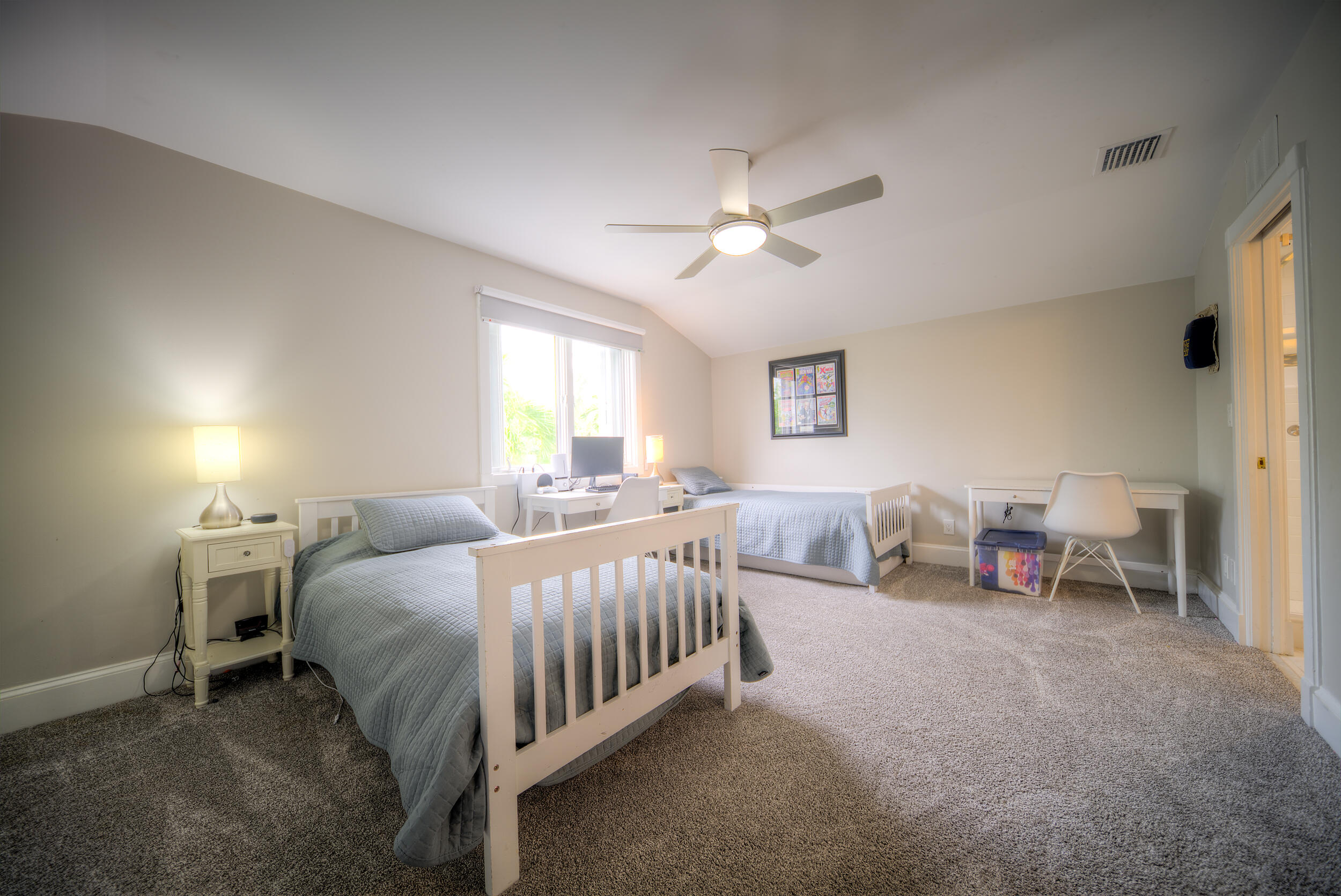 720 Washington Street Key West, FL 33040 - Photo 31 of 33 a bed room with a bed and a chair