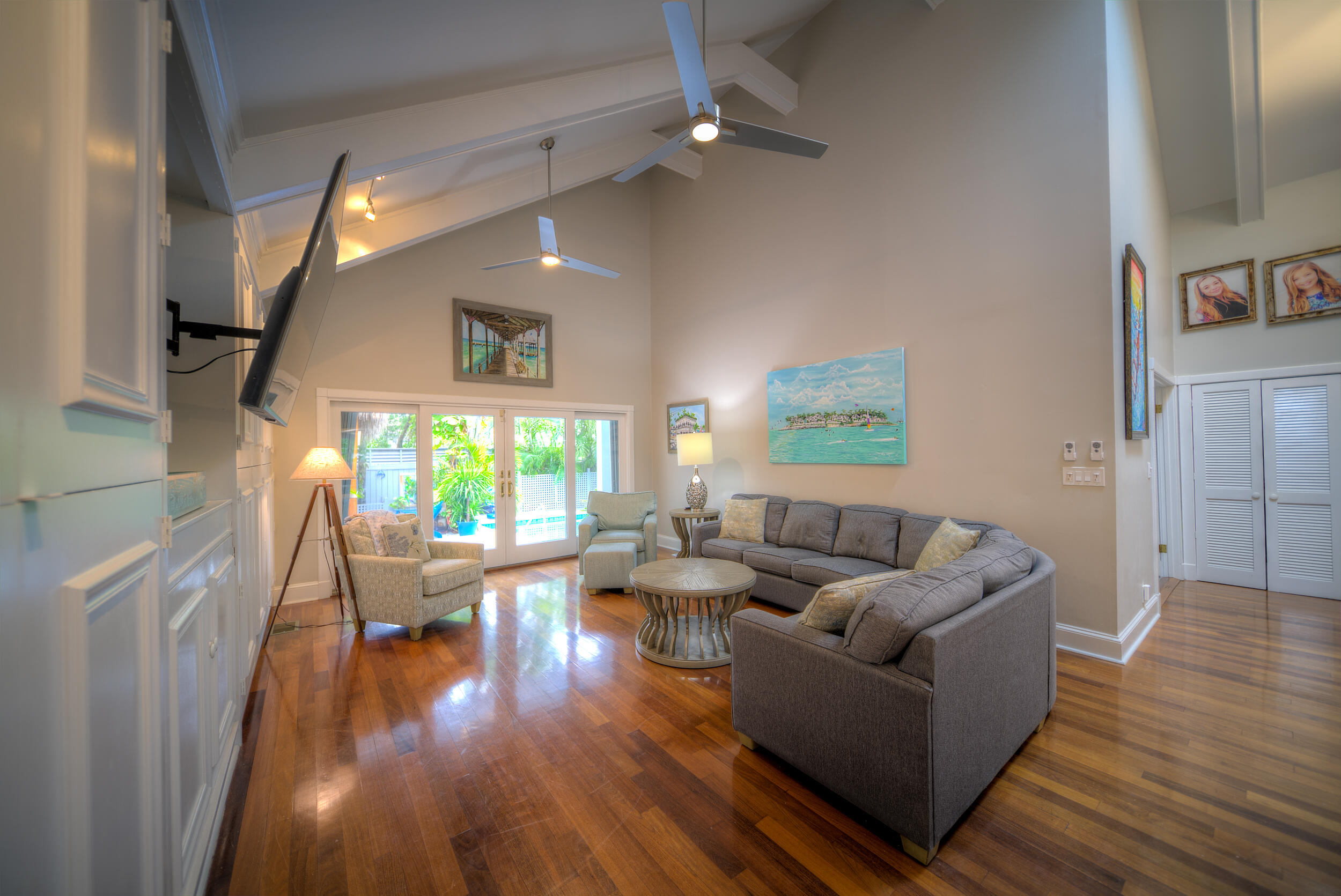 720 Washington Street Key West, FL 33040 - Photo 5 of 33 a living room with furniture and a wooden floor