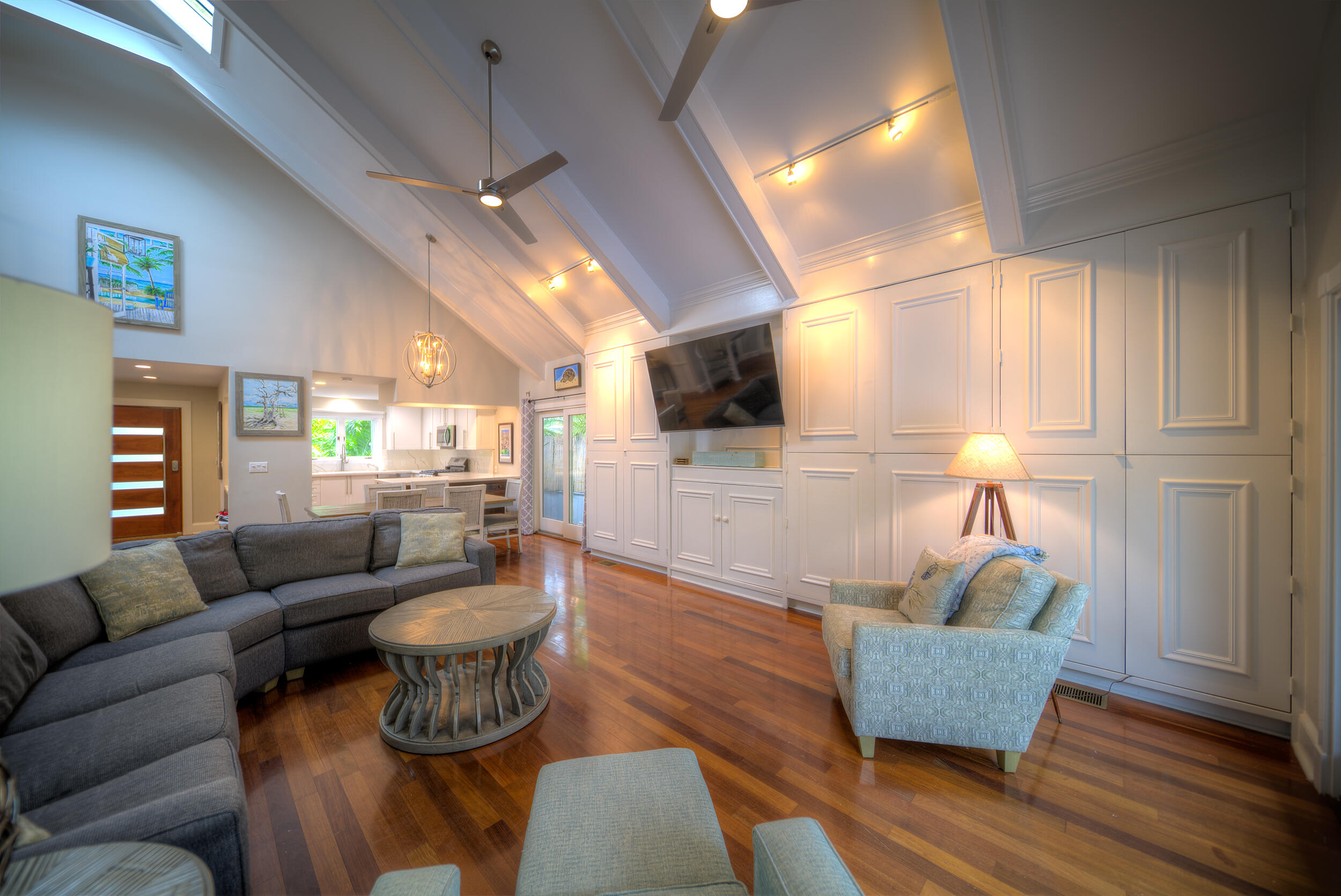 720 Washington Street Key West, FL 33040 - Photo 6 of 33 a living room with furniture and a flat screen tv