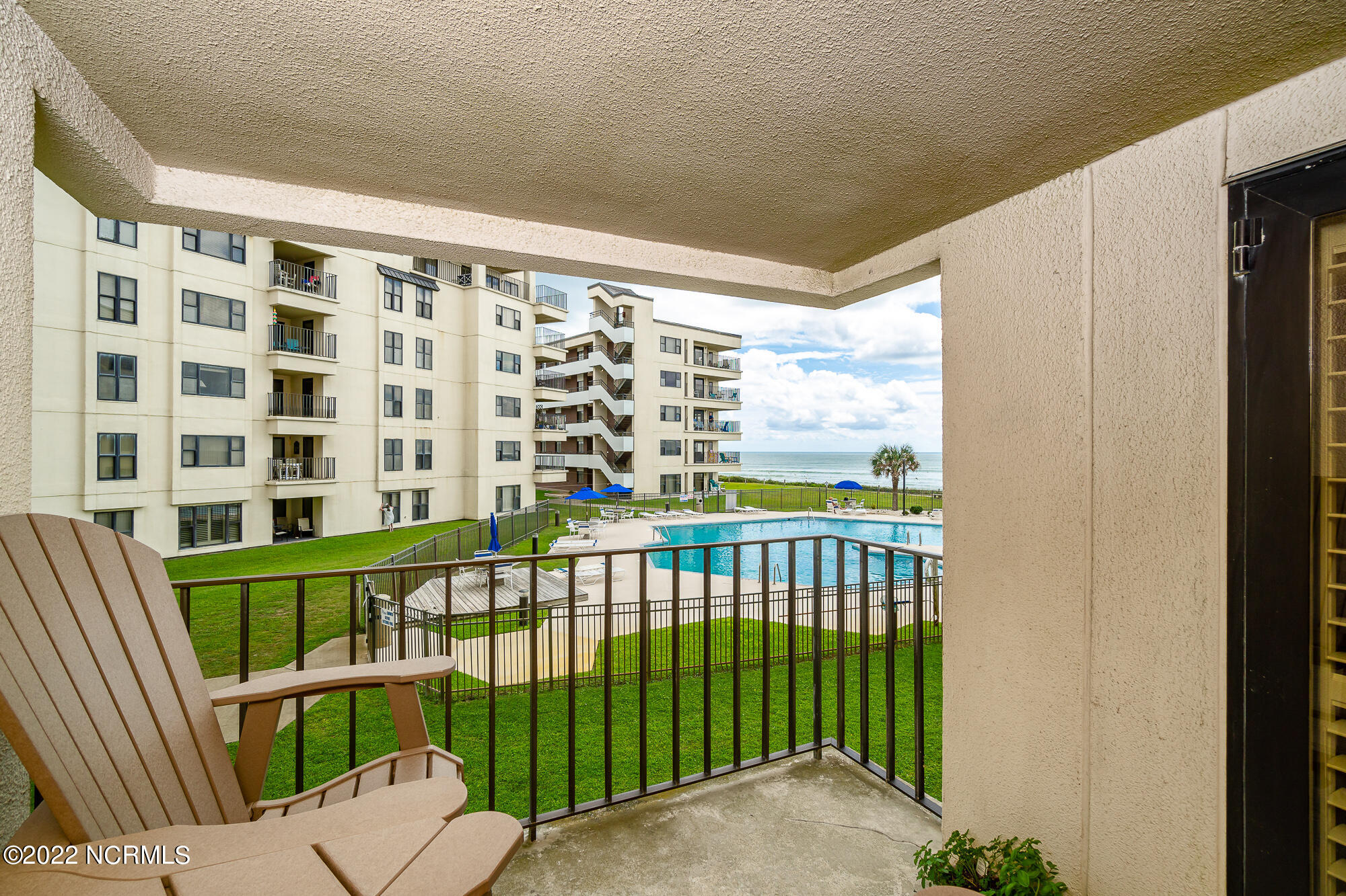 1505 Salter Path Road, Unit 235 Indian Beach, NC 28512 - Photo 3 of 58 Covered porch overlooking beach/pool