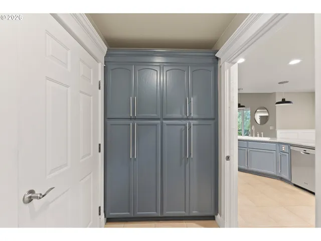 a bathroom with a tub shower and sink