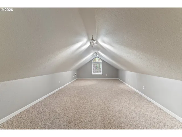 a view of a livingroom with a staircase