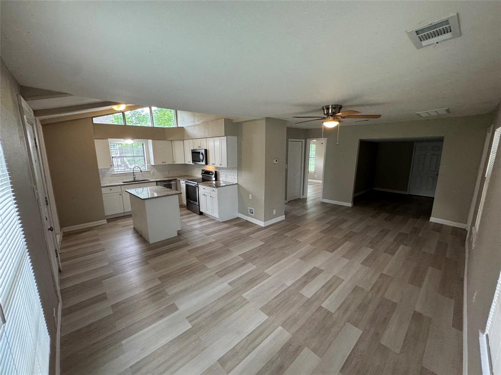 212 3rd Street Celeste, TX 75423 - Photo 1 of 1 a view of a living room and a wooden floor