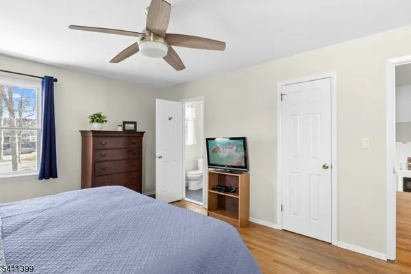 a view of a livingroom with wooden floor