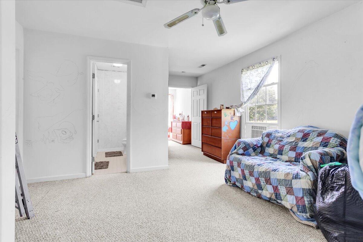 4090 Rockingham Boulevard Roanoke, VA 24014 - Photo 14 of 32 a bedroom with furniture and a chandelier