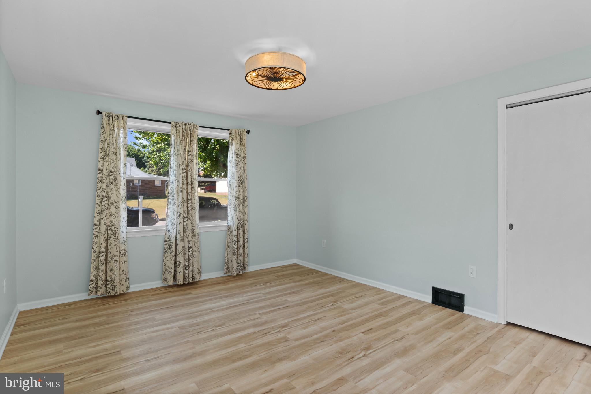 14 Sharon Road Enola, PA 17025 - Photo 16 of 40 Bright room featuring wood-finish flooring, light